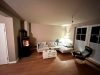 Wohn- und Esszimmer mit Blick zum Kaminofen