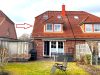 Ansicht Gartenseite mit Terrasse + Rasenfläche