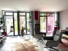 04-Wohnbereich mit Zugang zu Terrasse und Garten