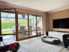 06-Wohnzimmer mit Blick in den Wintergarten